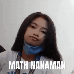 a girl wearing a mask and a lanyard with the words `` math nanama '' on it .