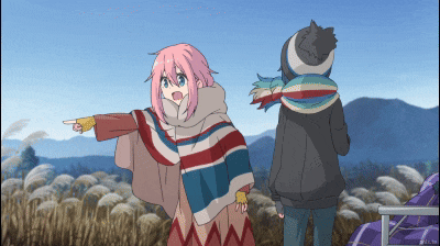 a girl with pink hair is pointing at something while a man stands behind her