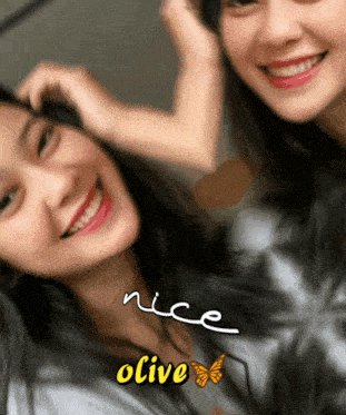 a blurred image of two girls with the words nice olive written on the bottom