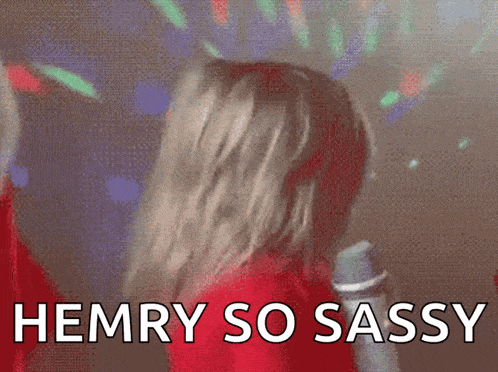 a woman singing into a microphone with the words " hemry so sassy " above her