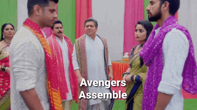 a group of people standing next to each other with the words " avengers assemble " on the bottom