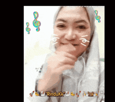 a picture of a woman with the word rindukk written on the bottom