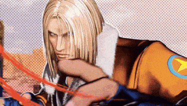 a man with long blonde hair is wearing a yellow jacket with a star on the sleeve