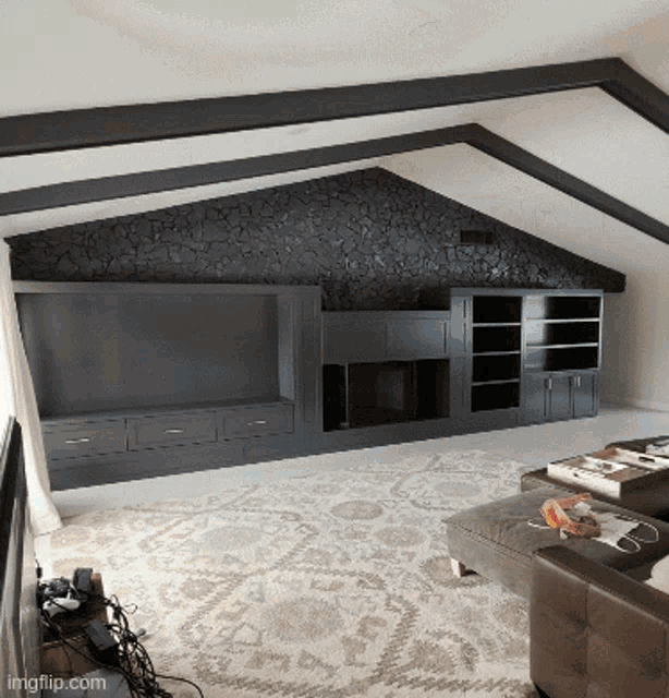 a living room with a tv and a fireplace with imgflip.com on the bottom right