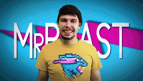 a man wearing a yellow shirt with the word mrbeast on it