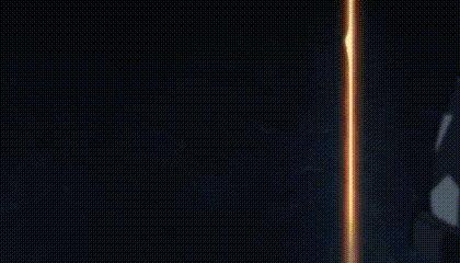 a close up of a balloon with a star on it in front of a wall .