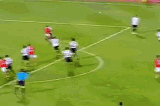 a pixelated image of a soccer game with a pepsi ad