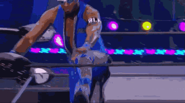 a pixelated image of a wrestler with the number 8 on his arm