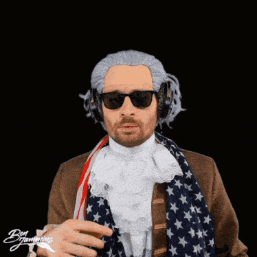a man wearing a wig and sunglasses has the name brannings on his shirt