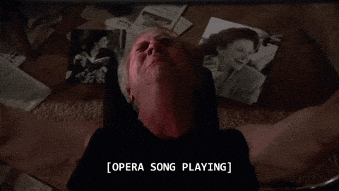 a man is lifting a barbell and the words opera song playing are above him