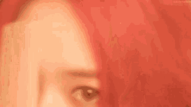 a close up of a woman 's face with the word krybe written on it