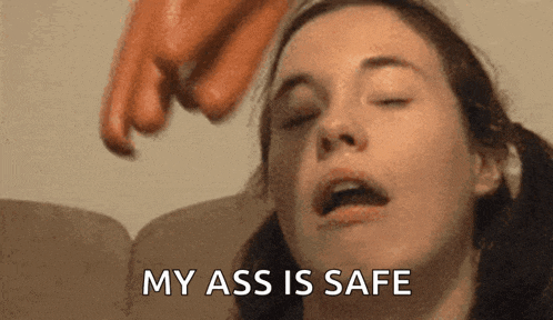 a close up of a woman 's face with the words `` my ass is safe '' written on the bottom .