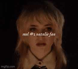a close up of a woman 's face with mel # 1 natalie fan written in white letters