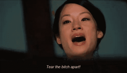 a woman with her mouth open and the words tear the bitch apart