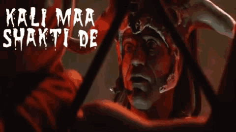 a movie poster for kali maa shakti de shows a man with horns on his head