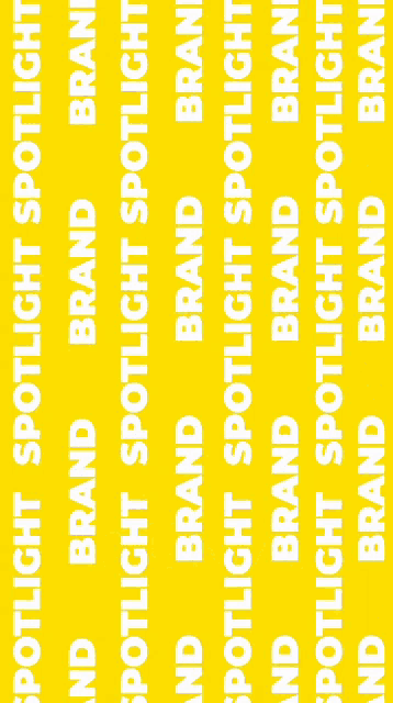 a man in a white shirt is standing in front of a yellow background that says spotlight brand