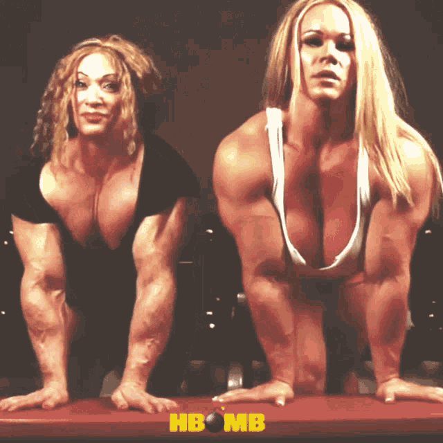 two female bodybuilders are posing for a photo with hb mb written on the bottom right