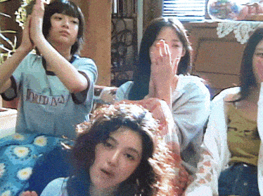 a girl wearing a shirt that says ' dri ' on it