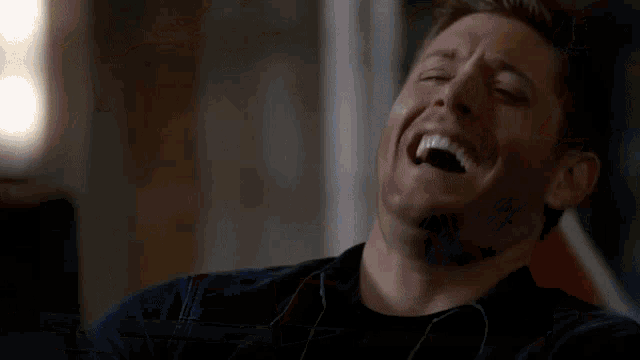 a boy and a girl are smiling on a computer screen that says movie player on it