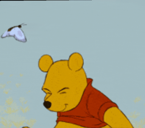 a winnie the pooh cartoon with a butterfly on his nose