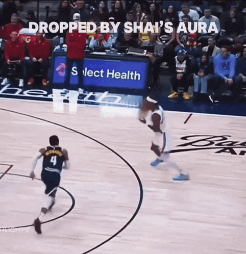 a basketball player with the number 4 on his jersey is dribbling the ball