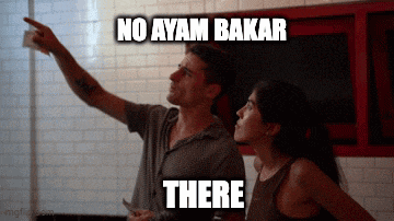 a man and a woman are standing in front of a brick wall with the caption no ayam bakar there above them
