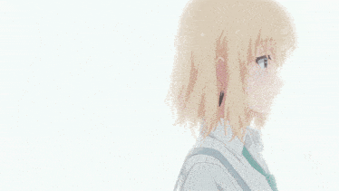 a girl with blonde hair and a green tie is smiling
