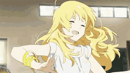 a girl with blonde hair is wearing a white shirt that says tbd
