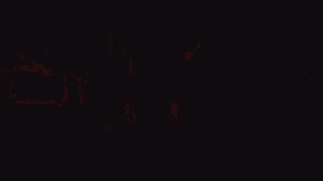 a blurred image of a stage with red lights on it