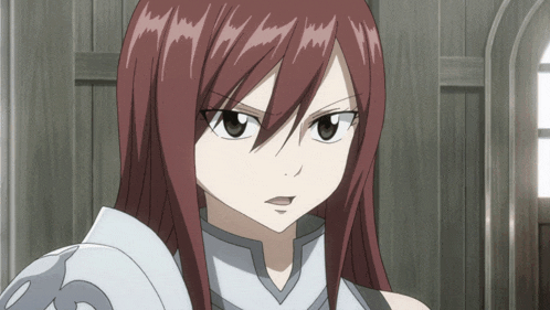 a girl with red hair and a white armor looks at the camera
