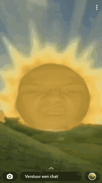 a phone screen shows a picture of a man 's face with the words verstuur een chat below it