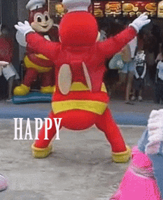 a jollibee mascot is dancing in front of a burger king