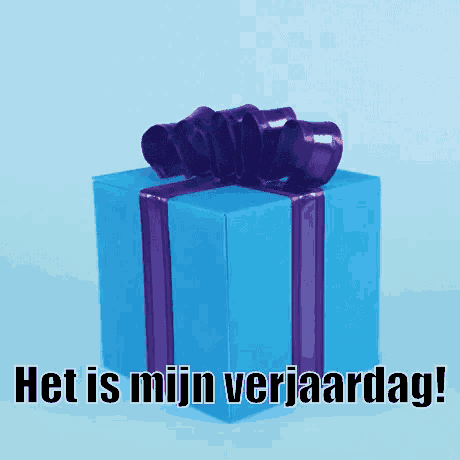 a blue gift box with a purple bow and the words het is mijn verjaardag