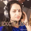 a woman wearing headphones and a microphone with the word excellent written on it .