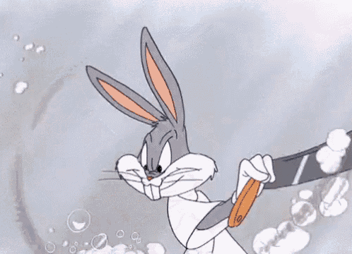 bugs bunny from looney tunes is holding a sword in his hand while standing in the water .