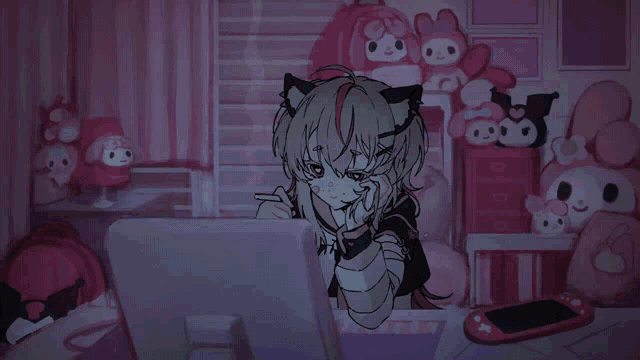 a girl with cat ears is looking at a laptop in a pink room