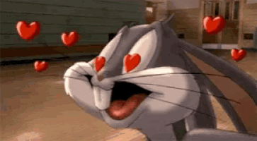 bugs bunny is surrounded by red hearts and has his eyes in the shape of hearts
