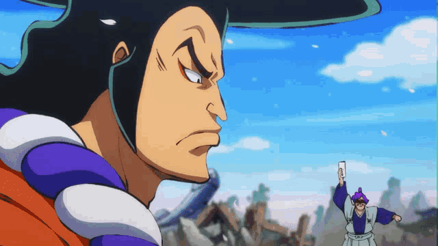 a man in a purple hat is holding a card in his hand
