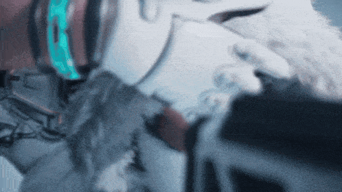 a blurred image of a person wearing a white glove with a blue stripe on it