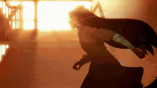 a silhouette of a person with a bottle of coca cola