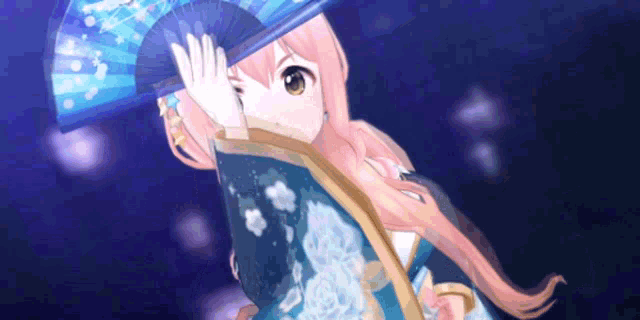 a girl in a blue kimono is holding a blue fan .