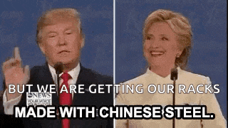 donald trump and hillary clinton are giving each other the middle finger while talking into microphones at a debate .