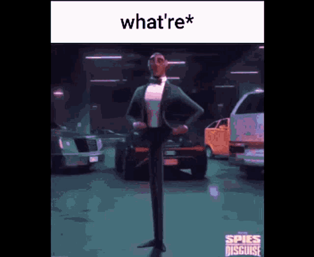 a man in a tuxedo is standing in front of a car in a parking garage .