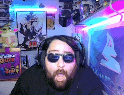 a man wearing sunglasses and headphones stands in front of a sign that says sumble guys
