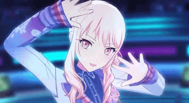 a girl with pink hair is wearing a purple shirt