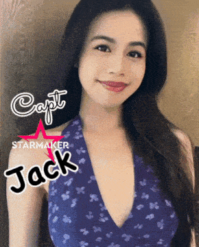 a woman in a blue dress with the name capt starmaker jack on it