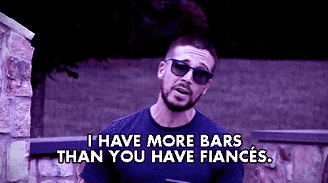 a man wearing sunglasses says i have more bars than you have fiancés