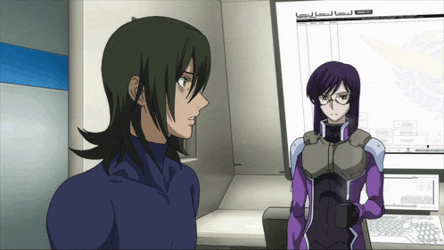 a man and a woman are standing in front of a screen that says ' lg '