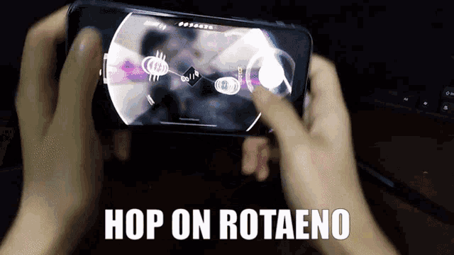 a person is playing a video game on their phone and the words hop on rotaeno are visible
