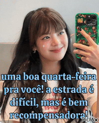 a girl is taking a picture of herself with a green case on her phone